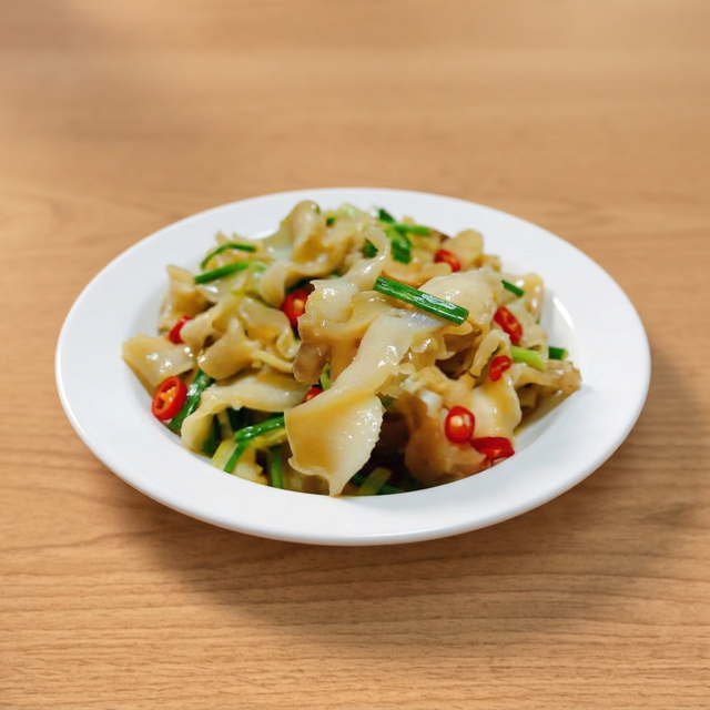 Stir-Fried Spicy Conch Slices.